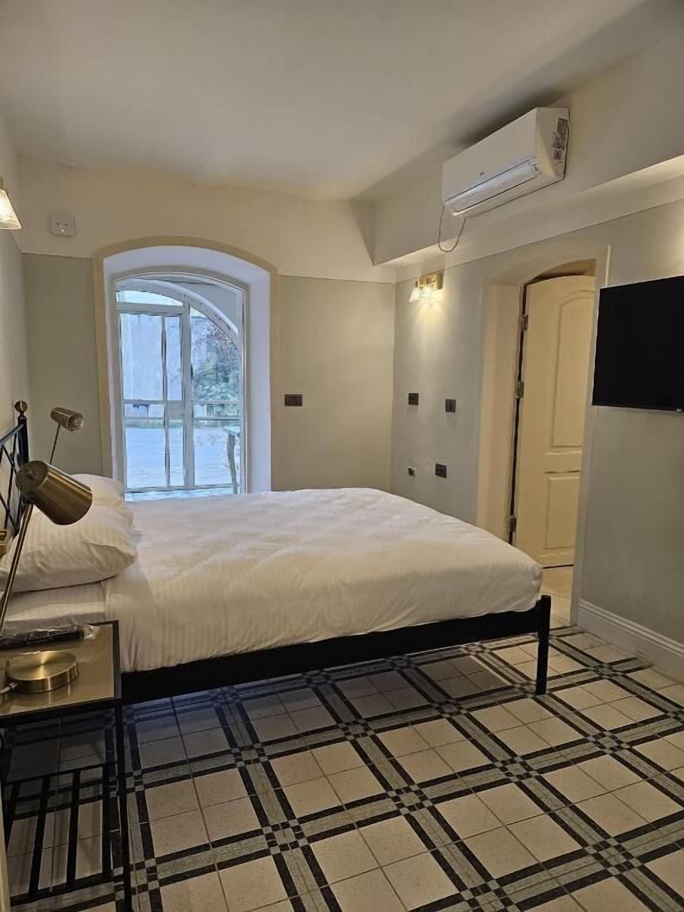 Exclusive Twin Room, Courtyard View | In-room safe, blackout drapes, iron/ironing board, free WiFi