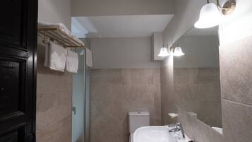 Hair dryer, towels, soap, toilet paper