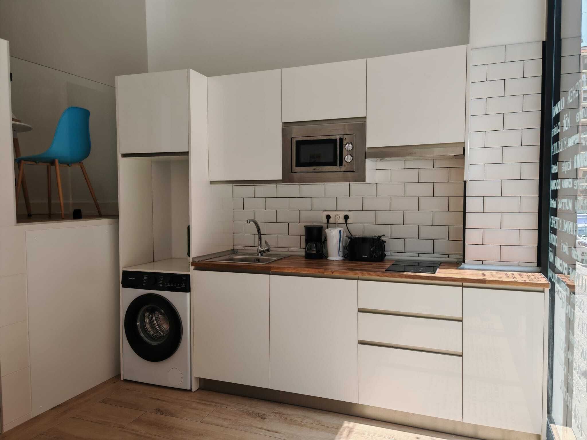 Mini-fridge, microwave, stovetop, cookware/dishes/utensils