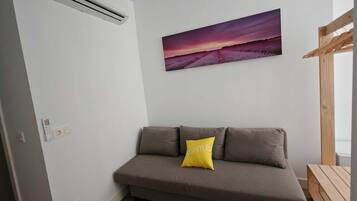 Quadruple Room | Living area