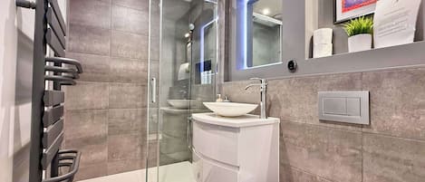 Shower, hair dryer, shampoo