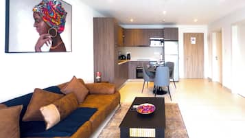 Appartement Deluxe, vue ville | Coin séjour