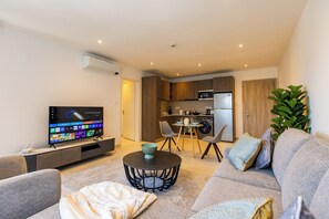 Deluxe-Apartment, Stadtblick | Wohnbereich