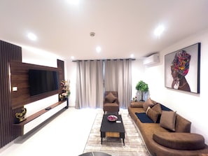 Deluxe-Apartment, Stadtblick | Wohnbereich