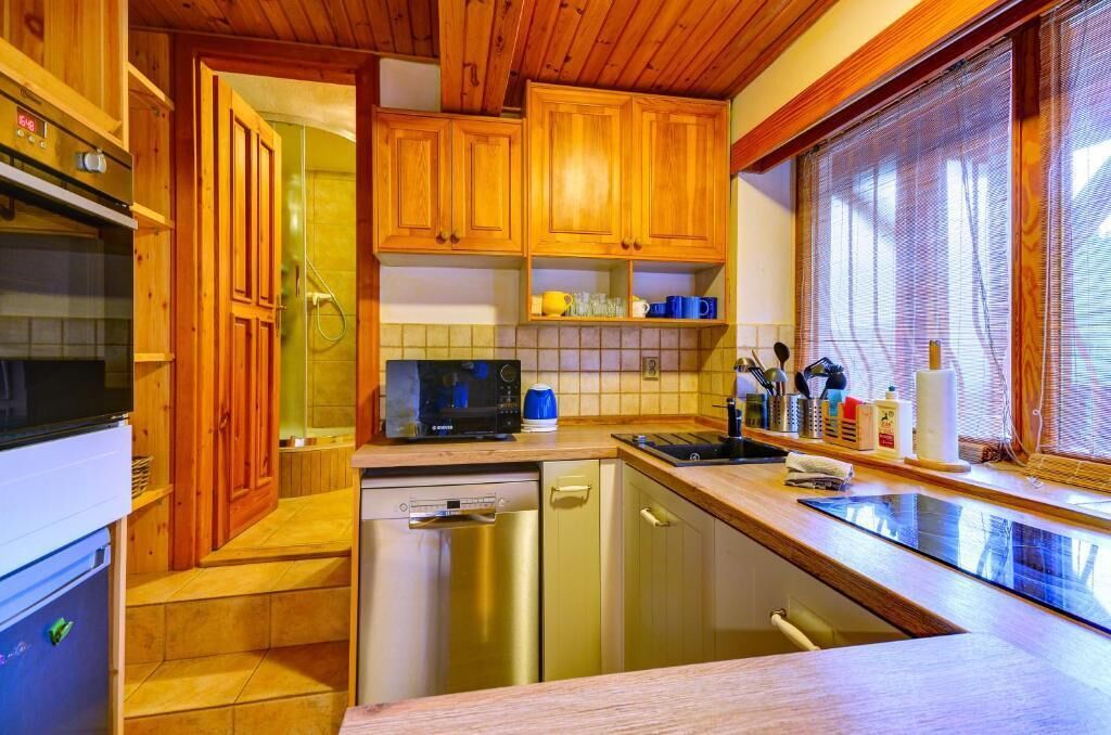 Appartement Deluxe, vue cour intérieure | Cuisine privée | Bouilloire électrique