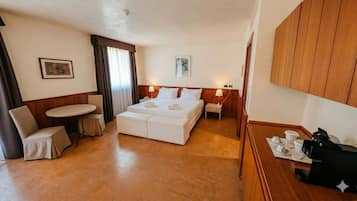 Standard Double or Twin Room, Balcony, Golf View | In-room safe, desk, laptop workspace, blackout drapes