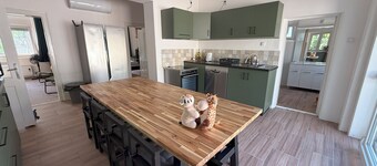 Large house fully equipped at the border of a lake with view over the water