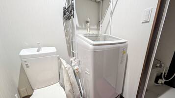 Hair dryer, towels, soap, toilet paper
