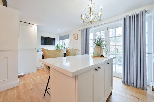 Traditional Apartment | Living area | 32-inch Smart TV with digital channels, fireplace