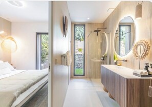 Shower, eco-friendly toiletries, hair dryer, towels