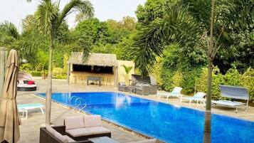 Outdoor pool, open 8:30 AM to 6:00 PM, free cabanas, pool umbrellas