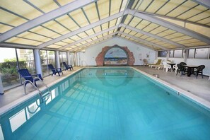 Indoor pool - Beautiful 1 bedroom oceanfront condo, free WiFi, linens included and an indoor pool located right on the boardwalk! (Ocean City)