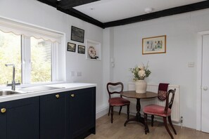 Fridge, microwave, oven, stovetop - The Collector’s House is a beautifully restored 3-bedroom home located on Arundel’s picturesque High Street, offering a unique blend of historic charm and modern comfort. (Arundel)