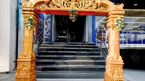 A staircase with ornate golden railings leading to an entrance. - Super Hotel O Kota Railway Junction (Kota)