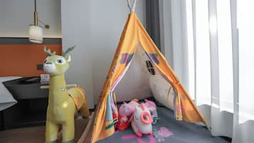 Desk, laptop workspace, blackout drapes, soundproofing