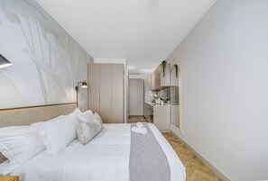1 habitación, tabla de planchar con plancha, wifi y ropa de cama 