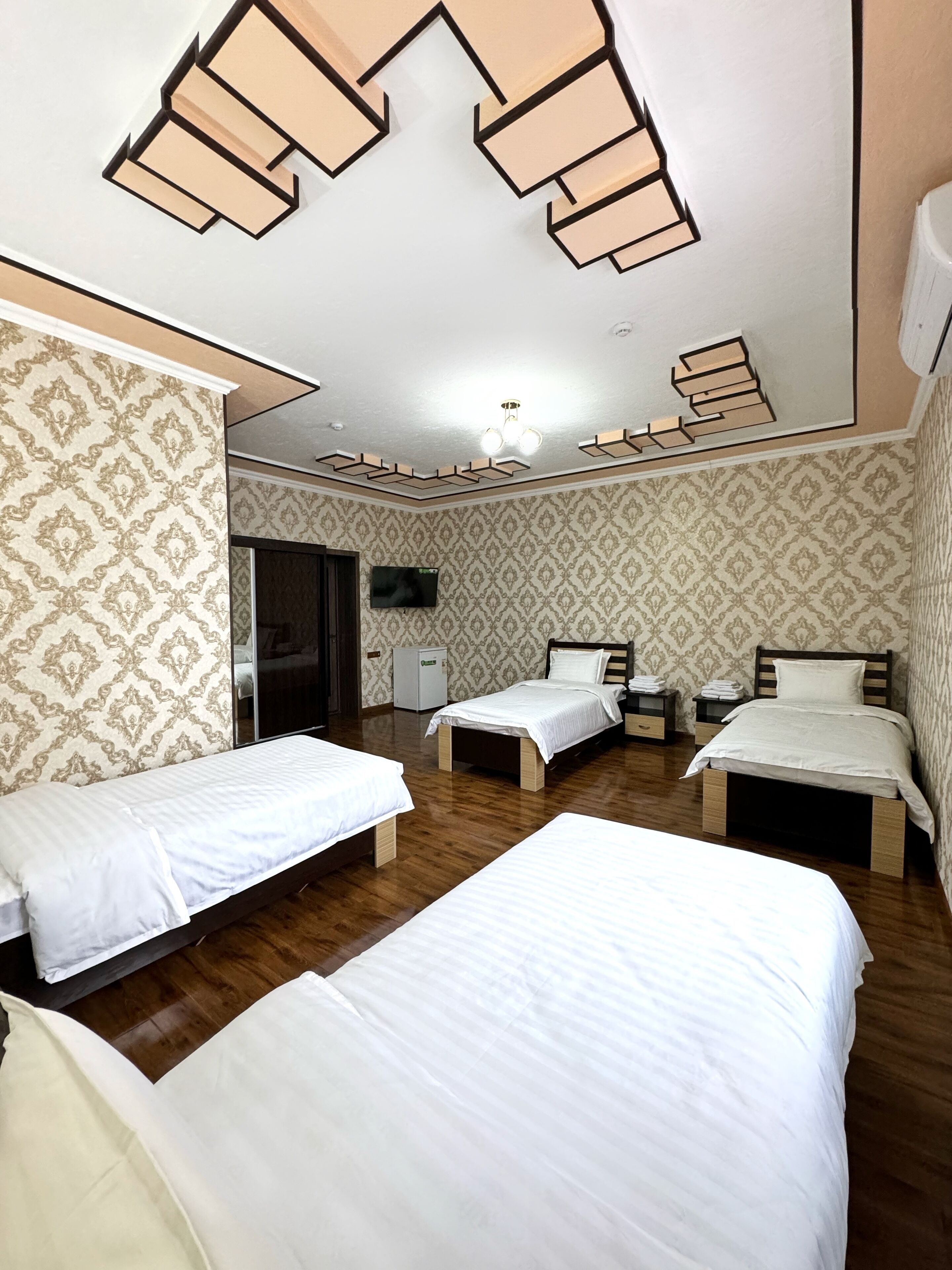 Standard Quadruple Room, Air conditioning | In-room safe, desk, blackout drapes, free WiFi