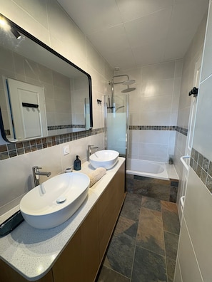 Shower, hair dryer, towels, soap