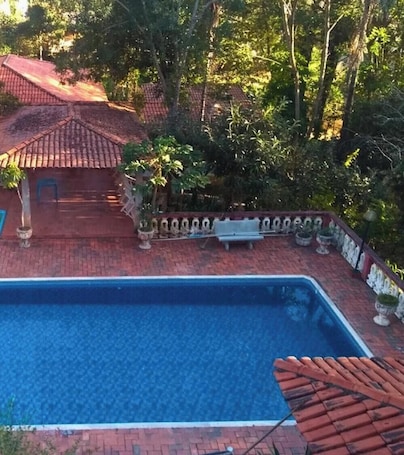 Outdoor pool. Pousada das Cores Cocais