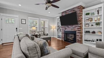 Smart TV, fireplace, books