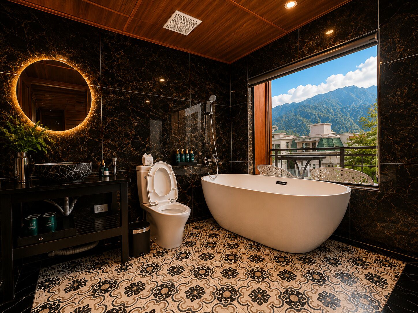 A bathroom with a freestanding bathtub, a toilet, a sink, and a large mirror.