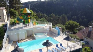 A heated pool - ZEcamping 4 étoiles piscine chauffée toboggans locatif 21m2 4 pers (Ucel)