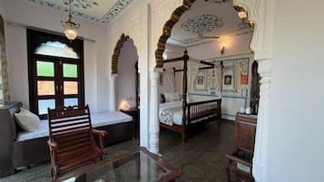 Luxury Suite, Garden View | In-room safe, desk, laptop workspace, iron/ironing board