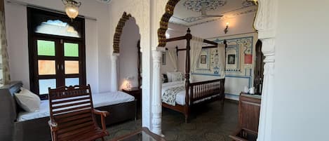 Luxury Suite, Garden View | In-room safe, desk, laptop workspace, iron/ironing board