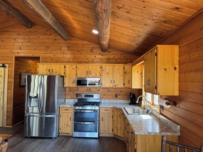 Private kitchen - Charming 2-bedroom lake cabin in lovely Pequot Lakes (Pequot Lakes)