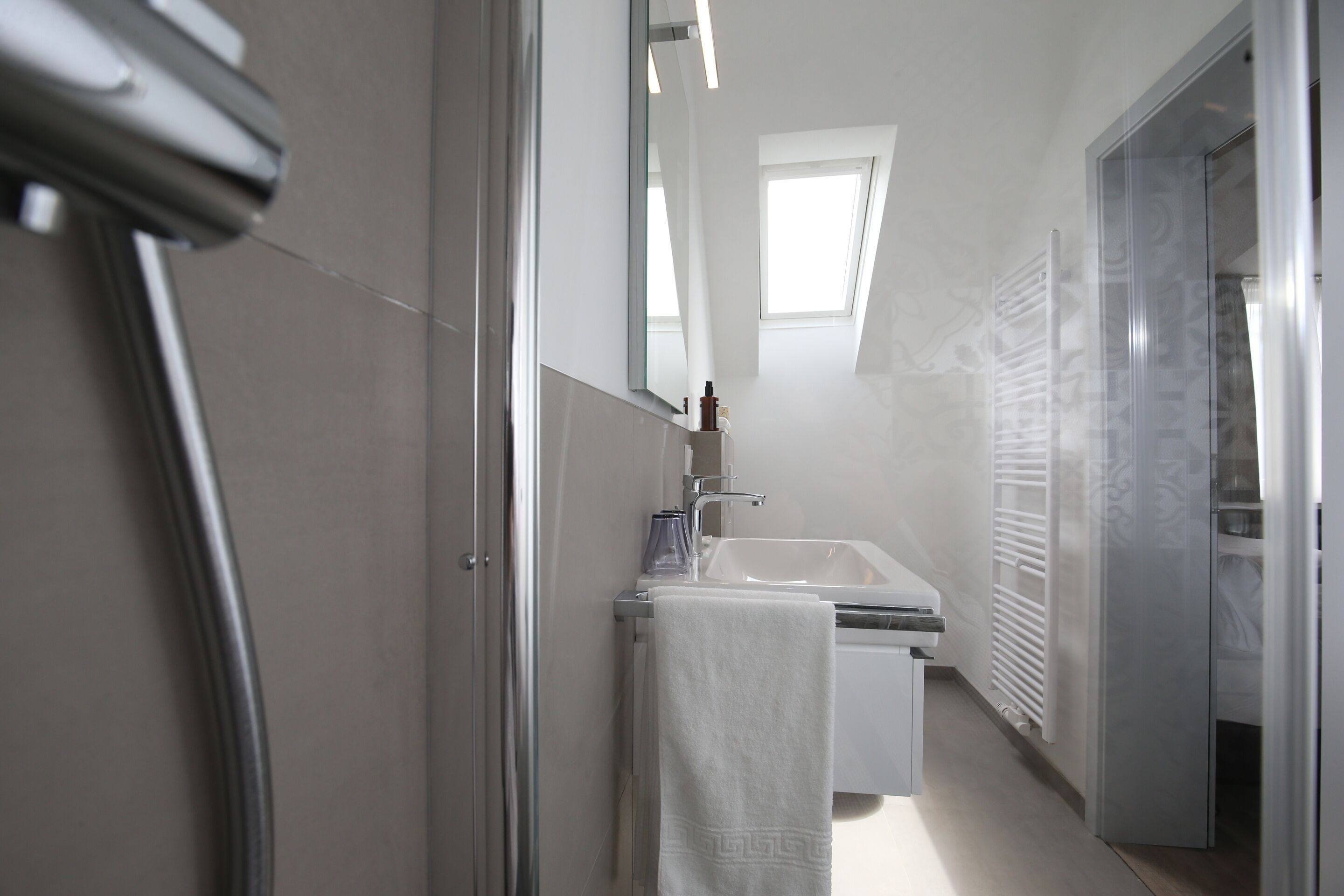Shower, free toiletries, hair dryer, towels