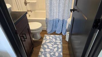 Hair dryer, towels, soap, toilet paper