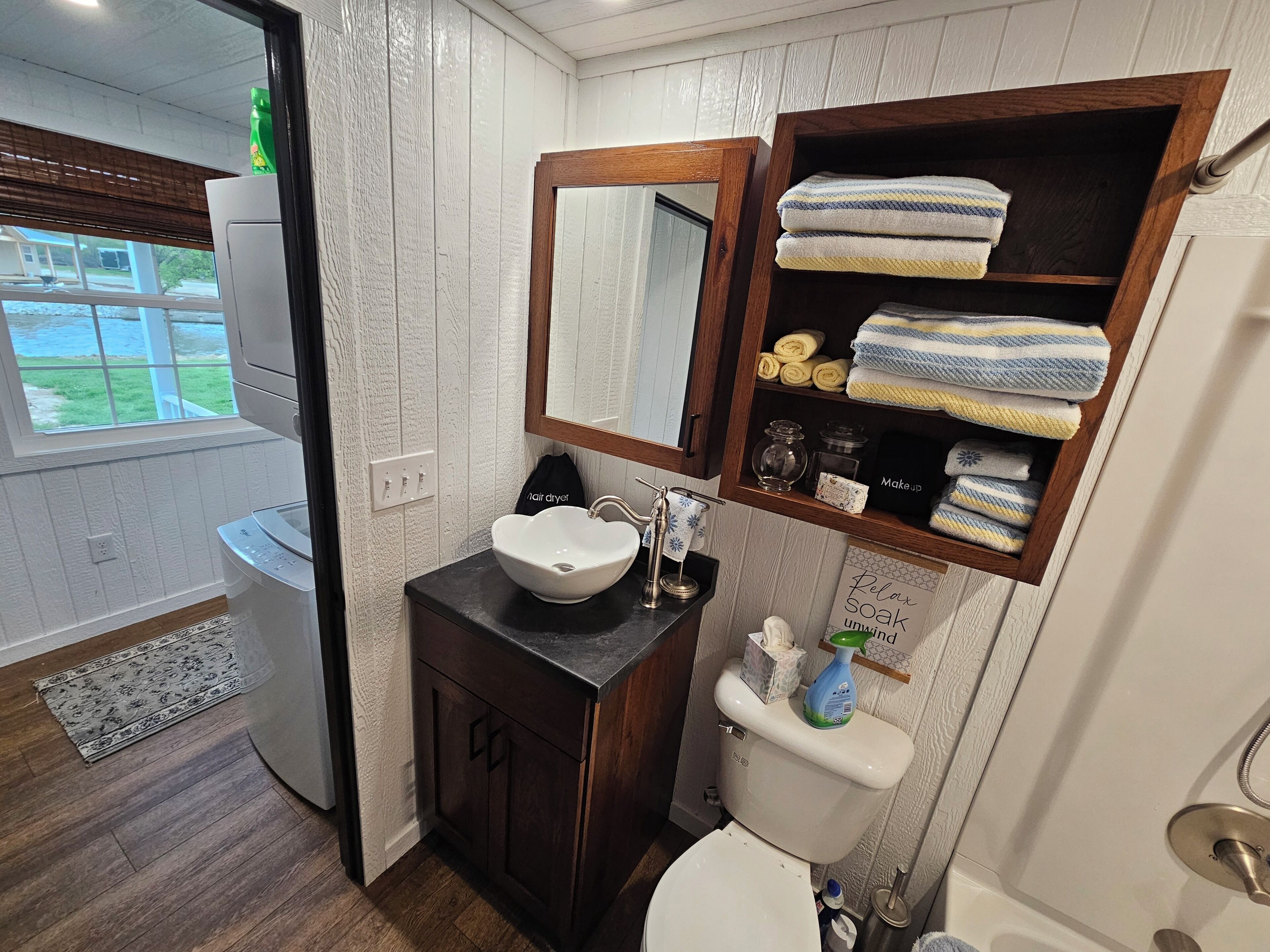 Hair dryer, towels, soap, toilet paper