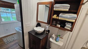 Hair dryer, towels, soap, toilet paper