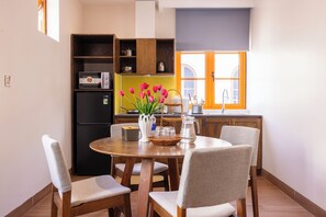 Family Room, 2 Queen Beds, Kitchen, Courtyard View | Dining - CIEL ROSE HOTEL (Phu Quoc)
