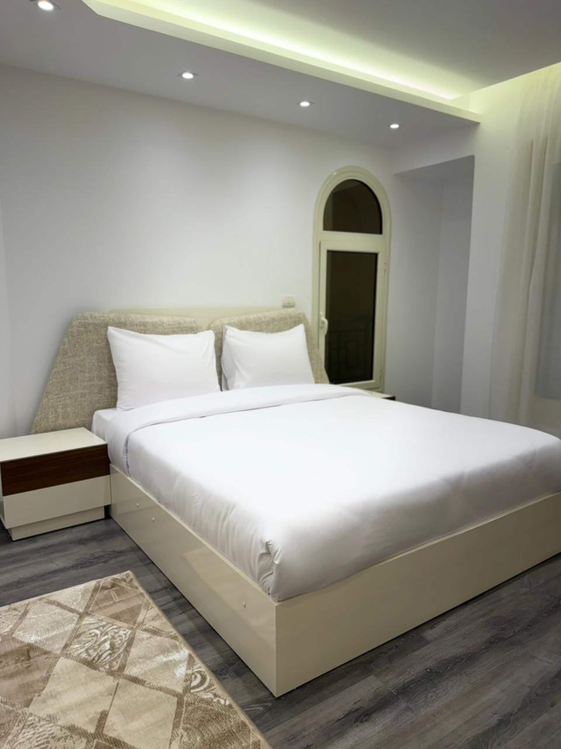 Egyptian cotton sheets, premium bedding, desk, laptop workspace