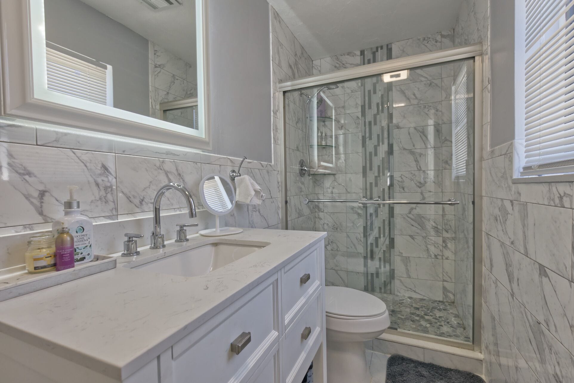 Shower, towels, soap, toilet paper