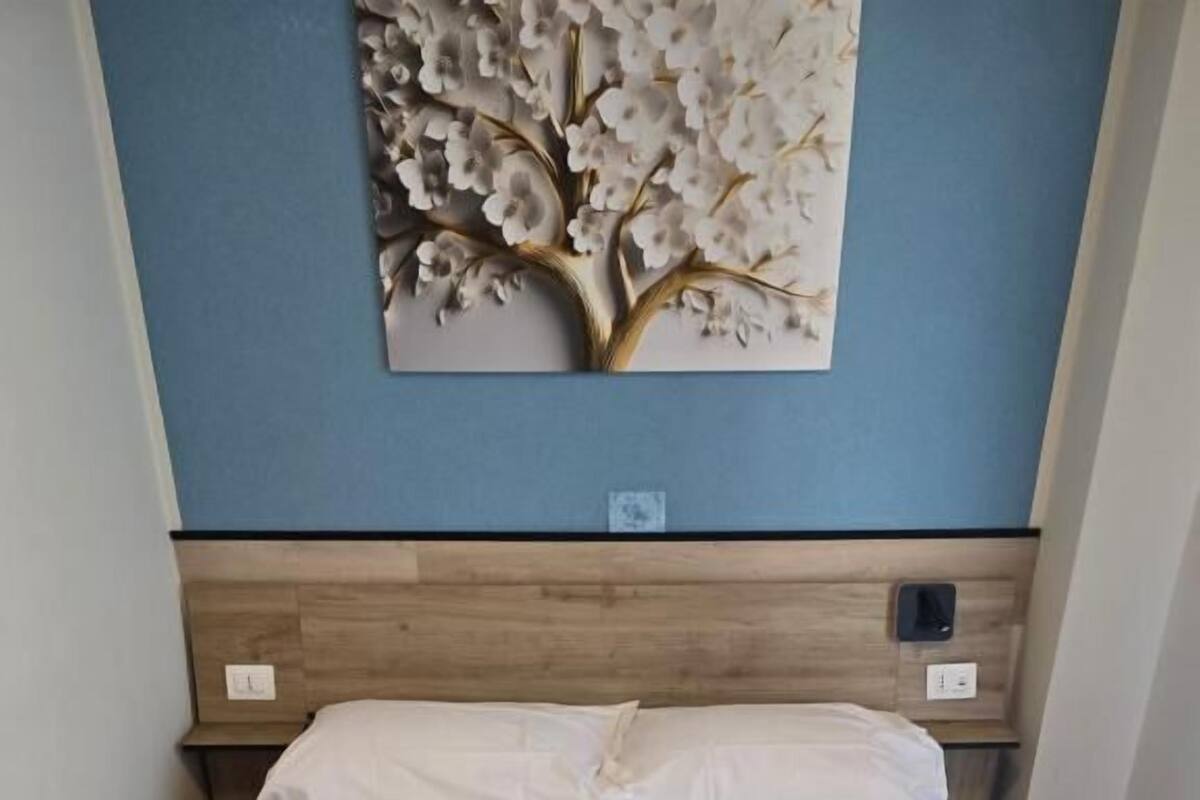 Economy Single Room, Balcony | Iron/ironing board, free WiFi