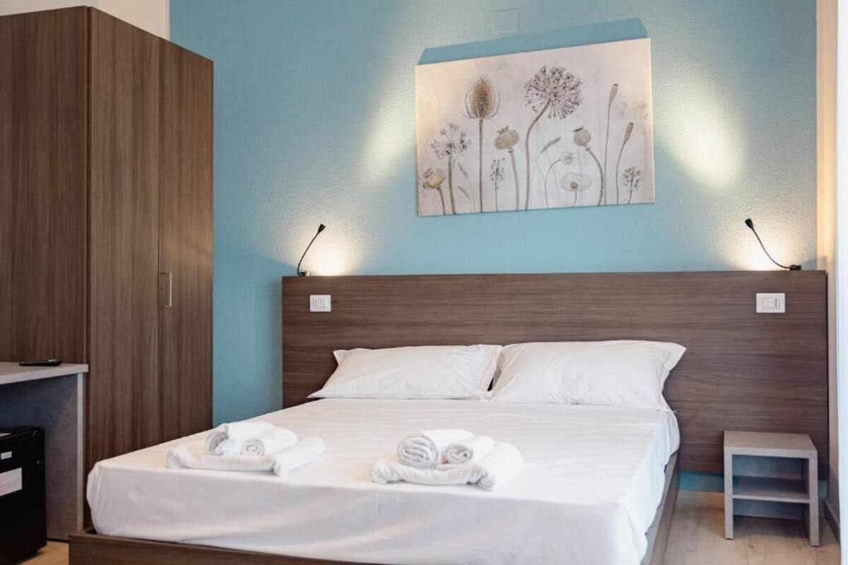 Quadruple Room, Pool View | Iron/ironing board, free WiFi