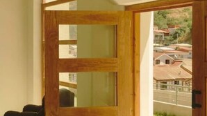 A room with a wooden door leading to an outdoor area. - Fully equipped apartment for 6 - Relax and enjoy Viña del Mar (Viña del Mar)