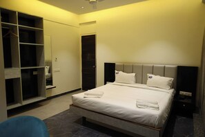 In-room safe, desk, laptop workspace, iron/ironing board - Hotel DP's Crown (Bengaluru)