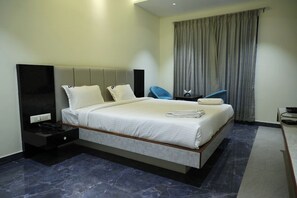 Deluxe Studio Suite | In-room safe, desk, laptop workspace, iron/ironing board - Hotel DP's Crown (Bengaluru)