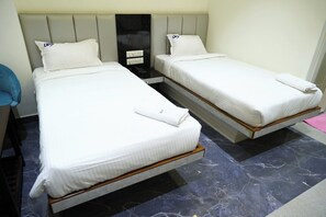 Classic Double or Twin Room | In-room safe, desk, laptop workspace, iron/ironing board - Hotel DP's Crown (Bengaluru)