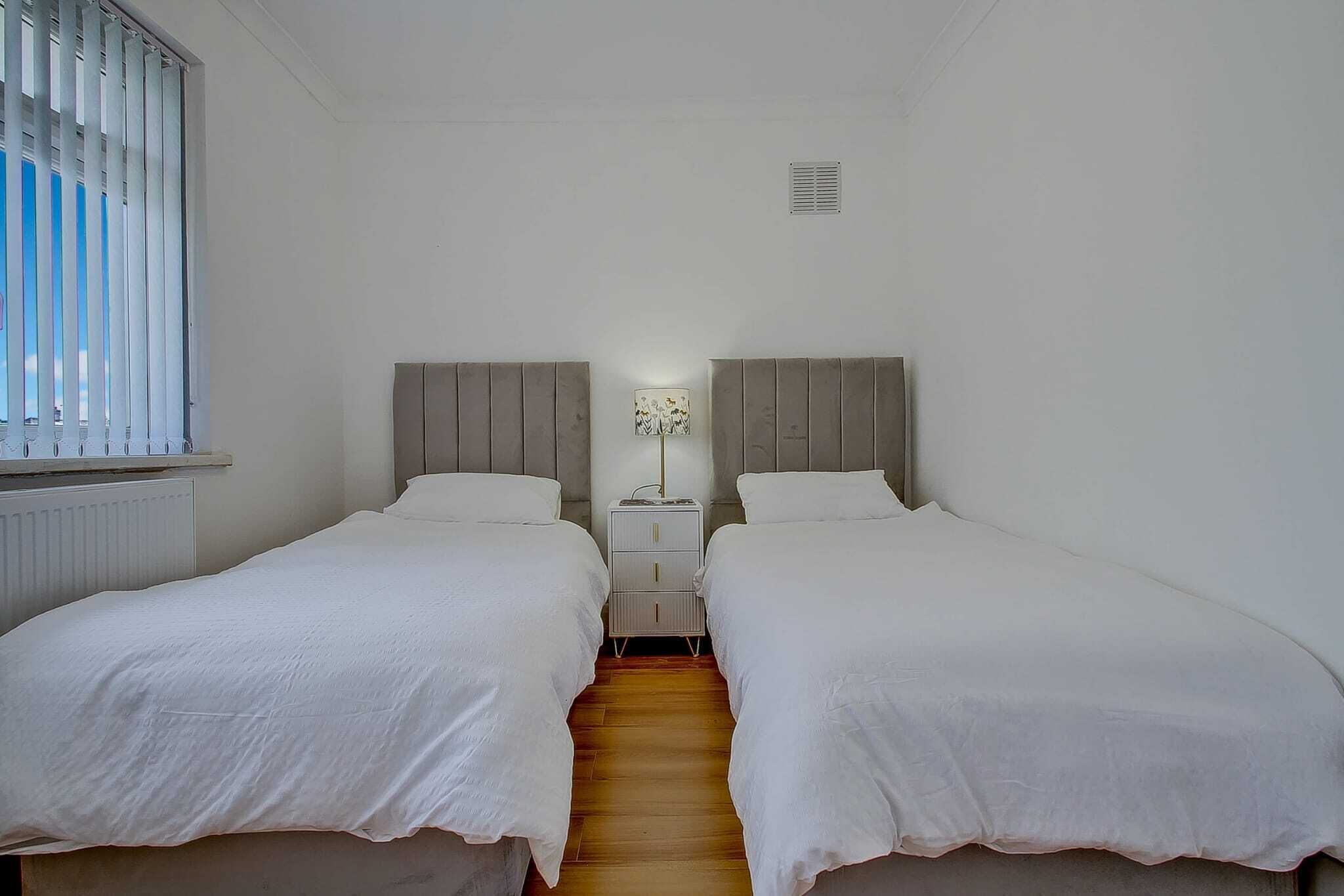 2 dormitorios, tabla de planchar con plancha, wifi gratis y ropa de cama