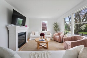 Ferienhaus, Terrasse, Gartenblick | Wohnbereich