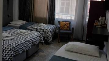 Classic Quadruple Room, City View | Free WiFi