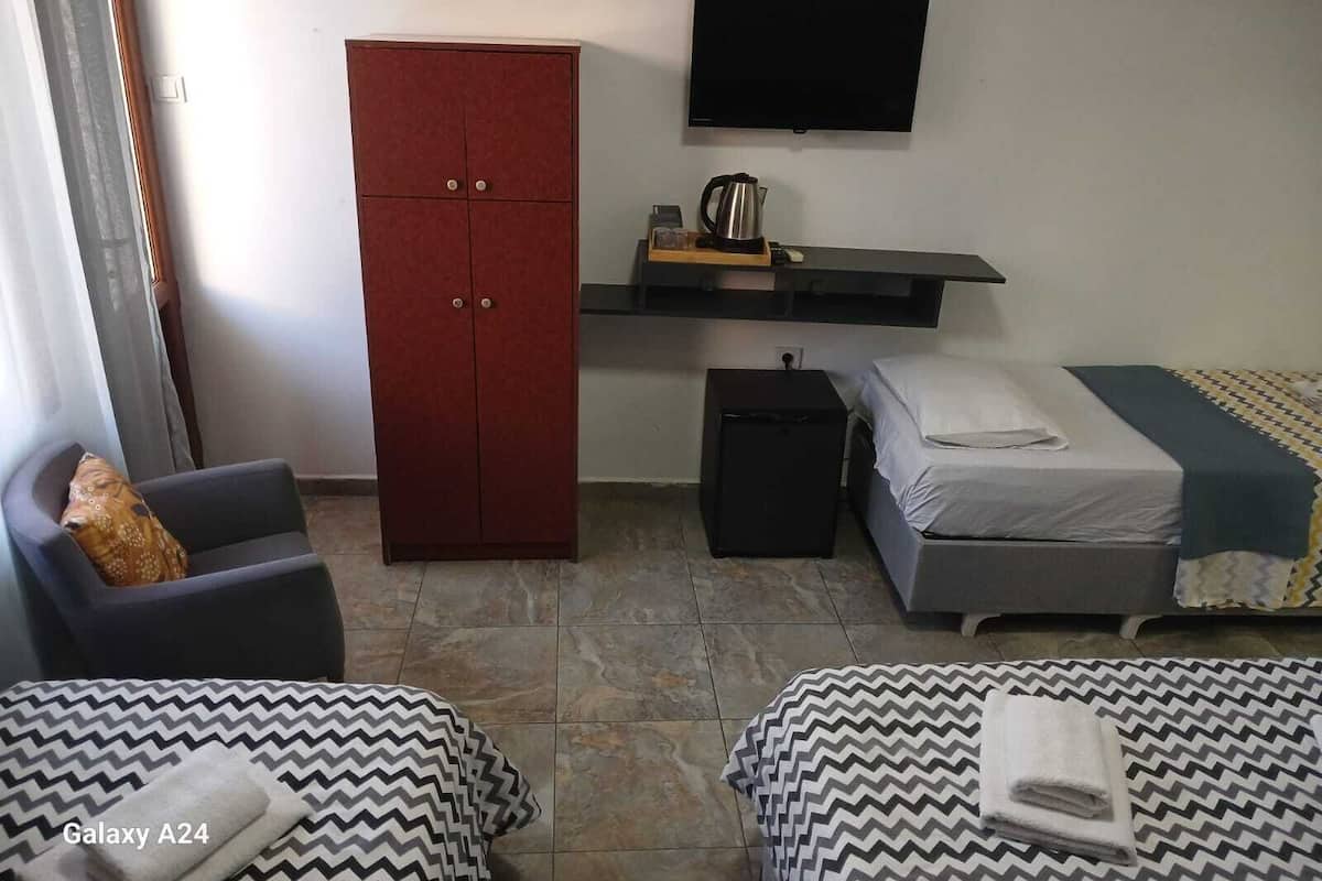 Classic Triple Room, Balcony, City View | Free WiFi