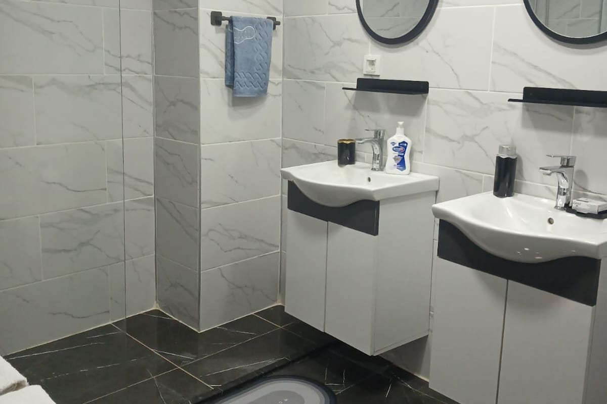Shower, free toiletries, towels, soap