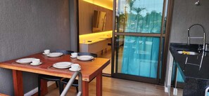 Outdoor dining - Premium Flat in Muro Alto Garden 06 B Resort Beach Class Verano (Ipojuca)