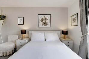 1 habitación, tabla de planchar con plancha, wifi gratis y ropa de cama 