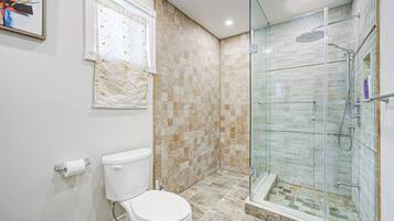 Hair dryer, towels, soap, shampoo